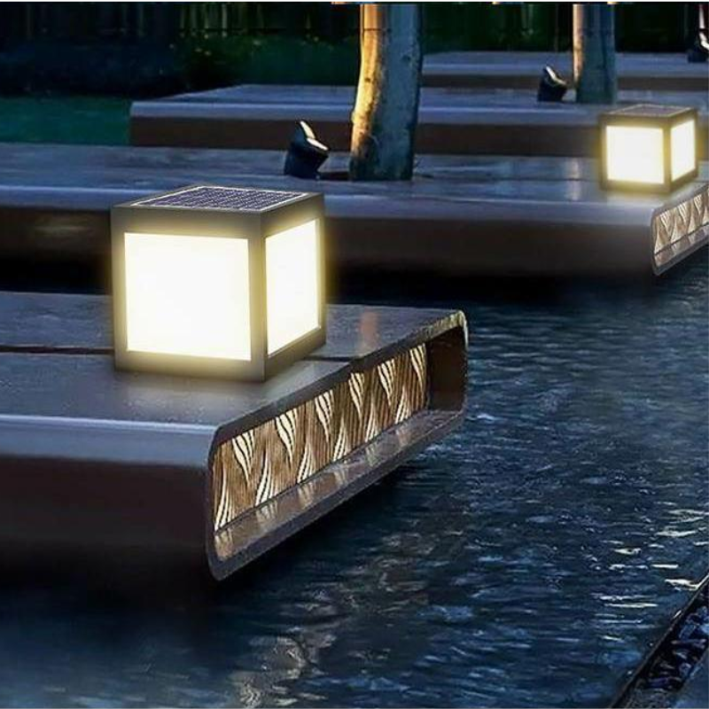Solar Pillar Square Light on steps near a body of water