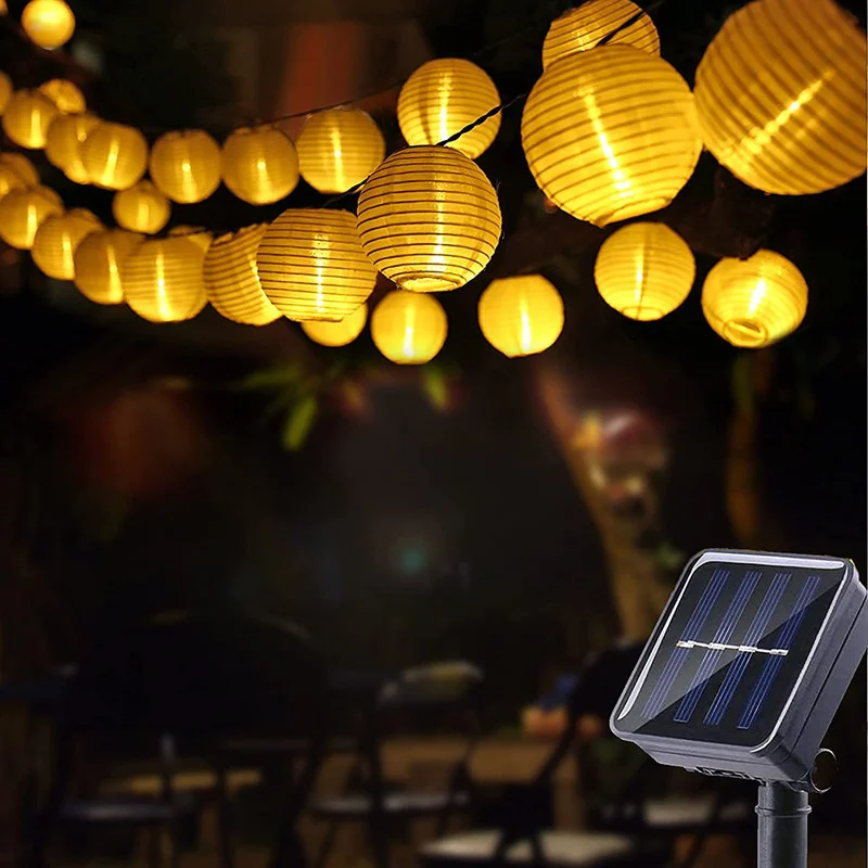 Waterproof Lantern Solar String Lights in the foreground.